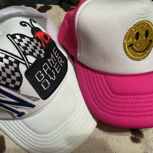 White and Pink Caps with Graphic Designs